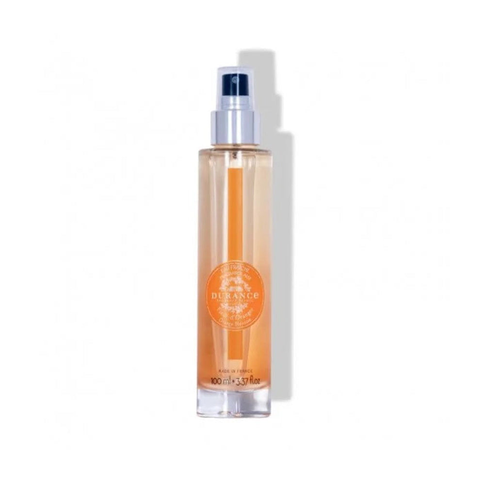 Verkoelende Durance Hair & Body mist in een oranje, glazen flesje in de geur Orange Blossom.