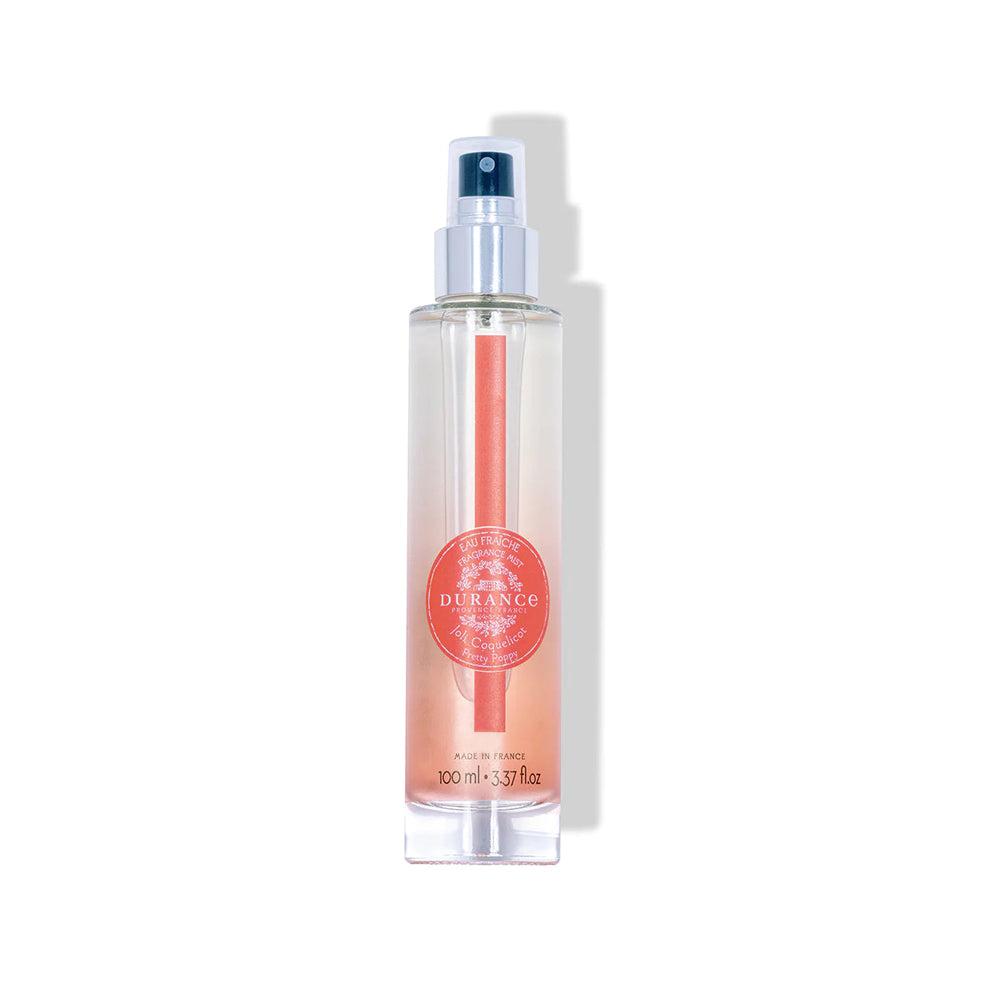 Verkoelende Durance Hair & Body mist in een blauw, glazen flesje in de geur Pretty Poppy.