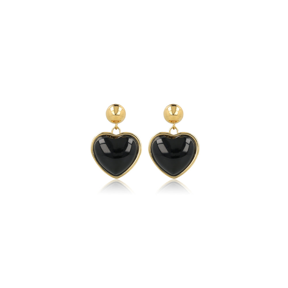 gouden hartjes oorbellen met black onyx steen van my bendel