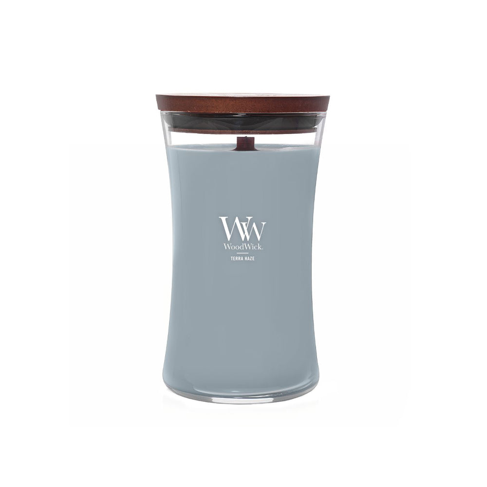 blauwe woodwick geurkaars large terra haze
