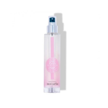 Verkoelende Durance Hair &amp; Body mist in een roze, glazen flesje in de geur Delicate Nympheas.
