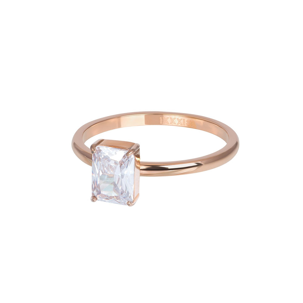 Rosékleurige IXXXI dames vulring met een rechthoekige Zirconia steen.