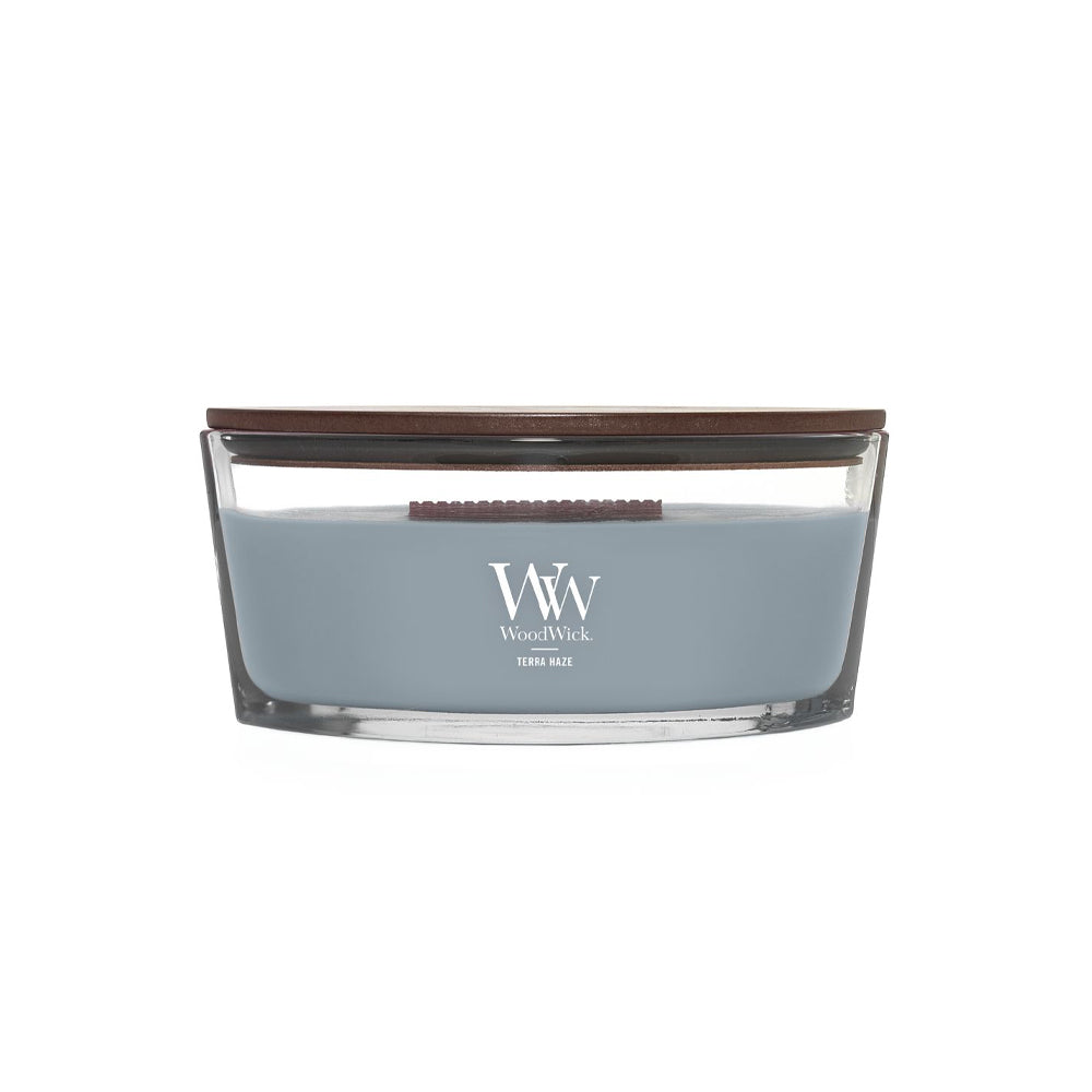 blauwe woodwick geurkaars ellipse terra haze